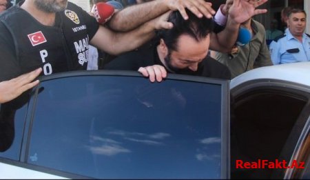 Türkiyə polisi Adnan Oktarın adamını paltar şkafından tapdı